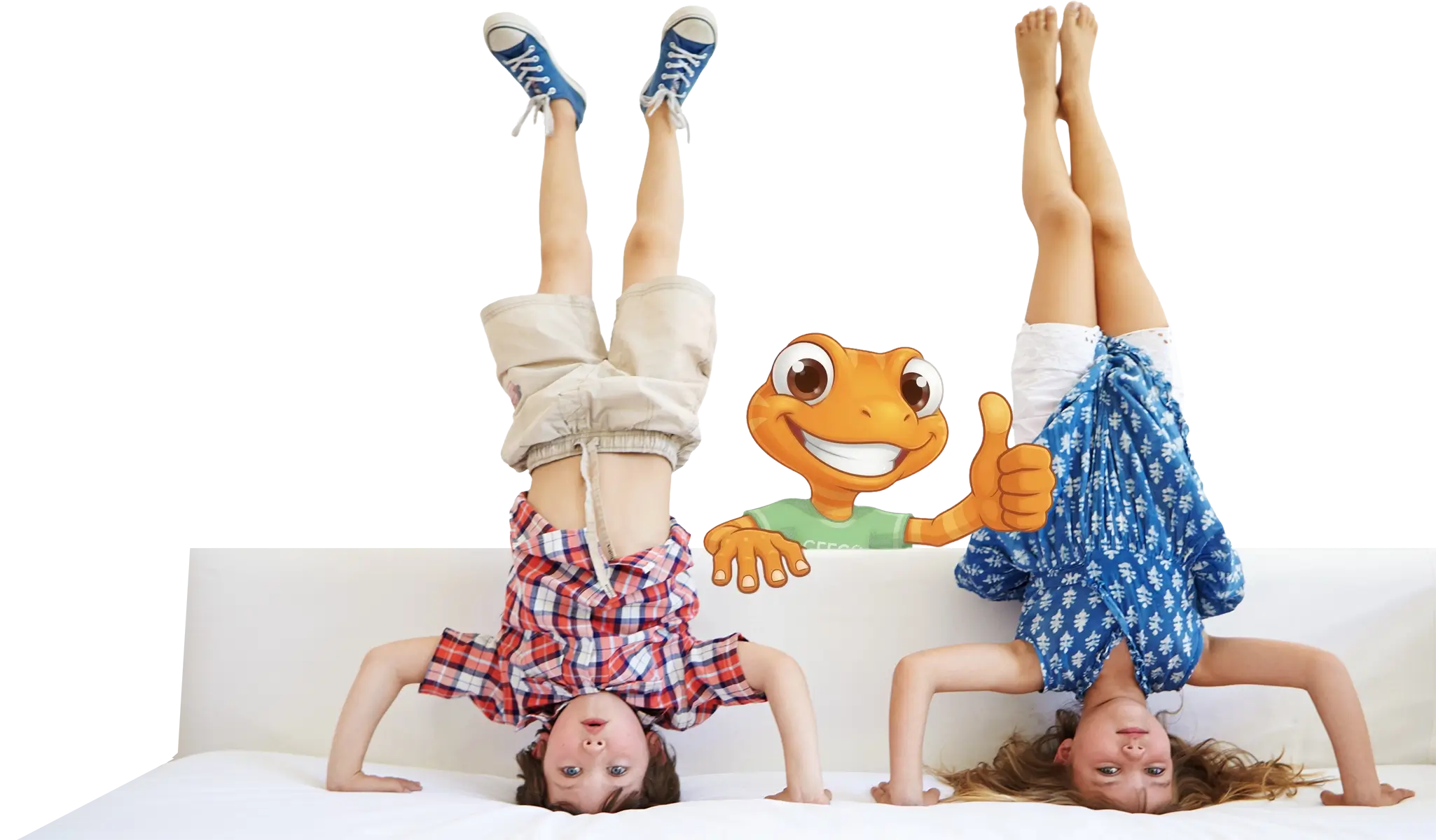 Two children practising headstands together