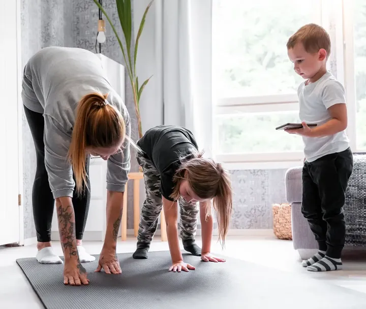 A child doing movement homework at home