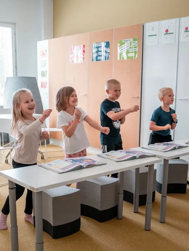 Schoolchildren moving together during a guided activity break